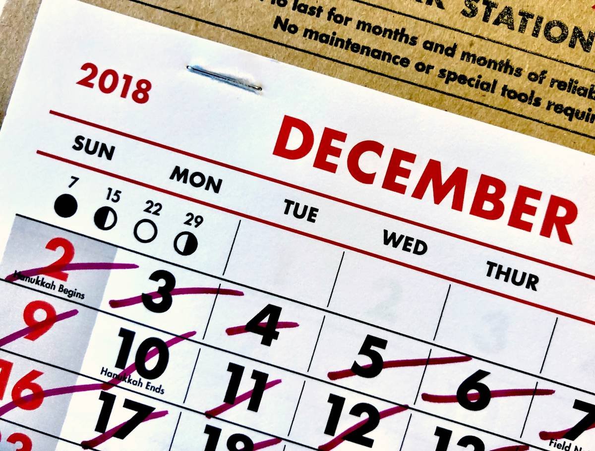 Man submitting credit card extended warranty claim form online for coverage extended benefit
