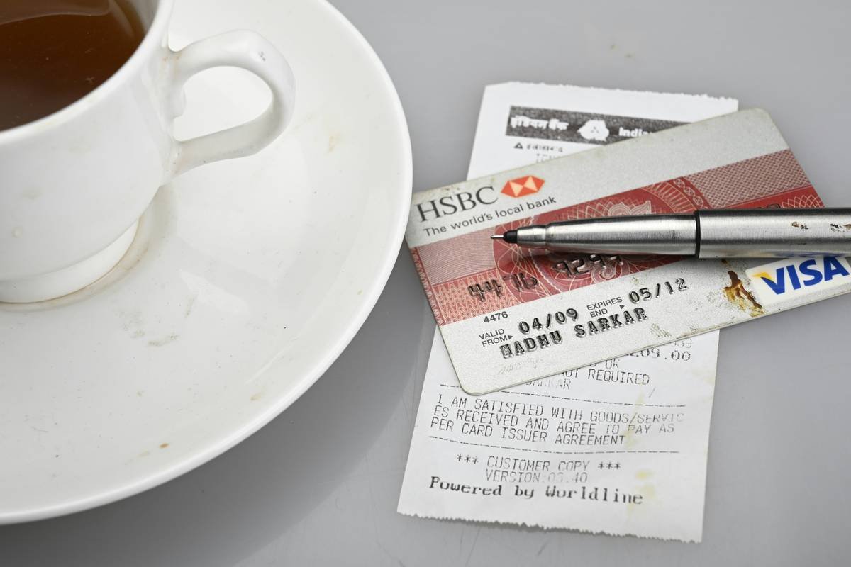 Credit card receipt showing include item extended coverage for a laptop purchase
